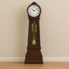 Wooden grandfather floor clock with quartz movement, Westminster chime, rich wood finish, intricate clock face, and pendulum design – elegant freestanding clock for traditional homes, offices, or formal interiors