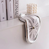 Melted seated clock