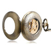 mechanical pocket watch with visible gears and transparent case for vintage style and horology enthusiasts
