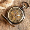 mechanical pocket watch with visible gears and transparent case for vintage style and horology enthusiasts