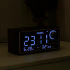 wooden alarm clock with digital display, FM radio, wireless charging, and motion sensor for modern luxury bedroom decor